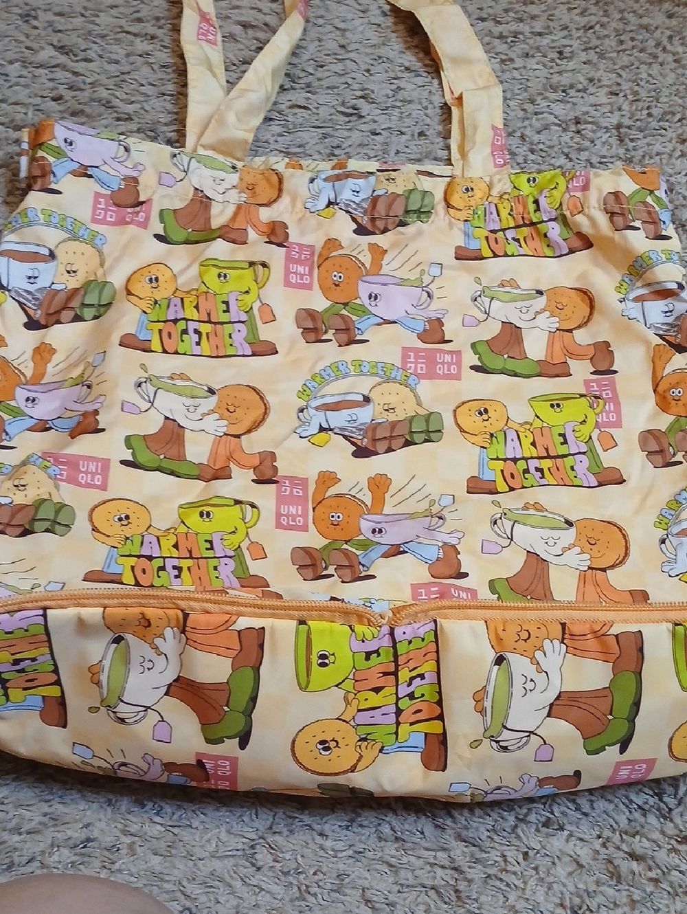 Uniqlo Cream Tote with Orange, Green & Purple Character Print